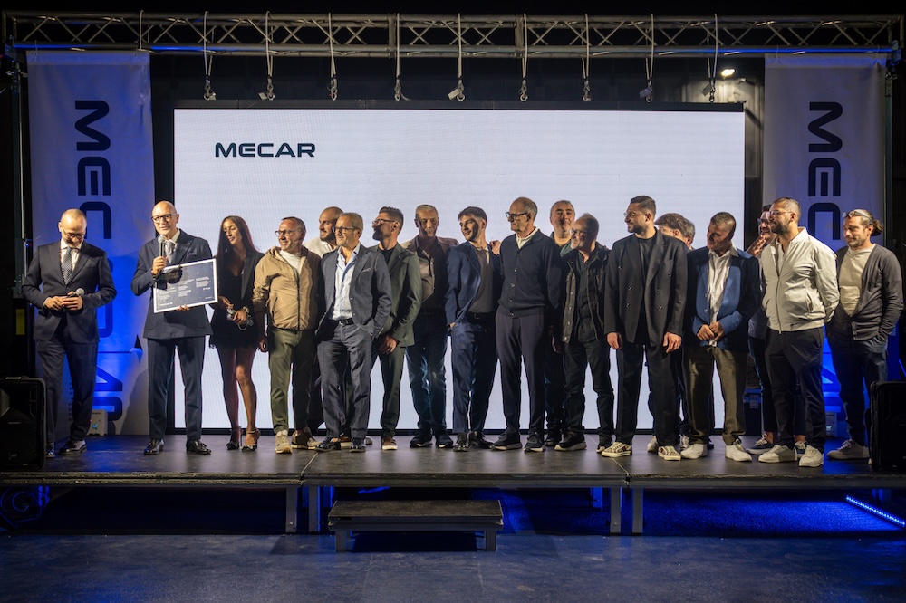 Collaboratrici e collaboratori Mecar sul palco